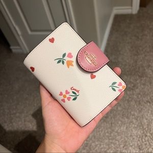 Coach medium zip wallet with heart petal print